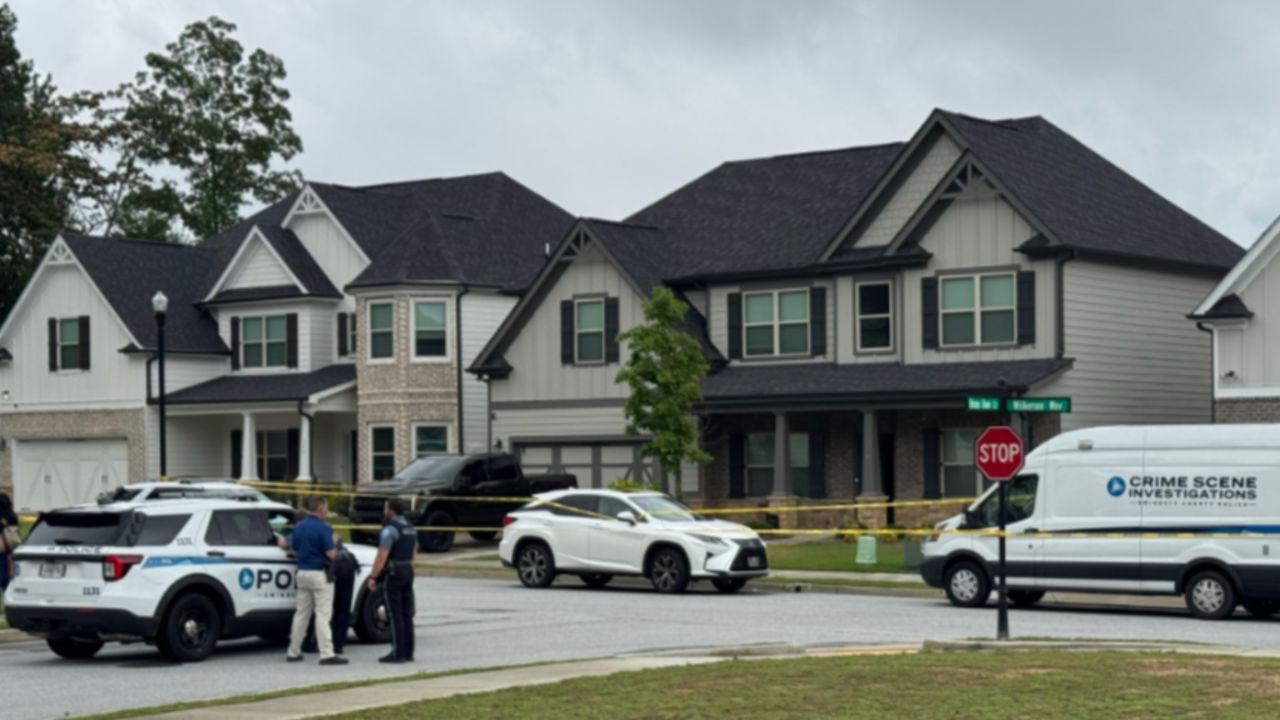 Neighbor found her body. Now a Grayson woman is charged with murder on her own street